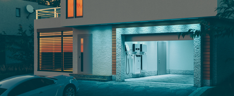 concept of a home battery energy storage system located in the garage of a modern family house in a futuristic blue light illuminating the evening atmosphere of a quiet street. 3d rendering.